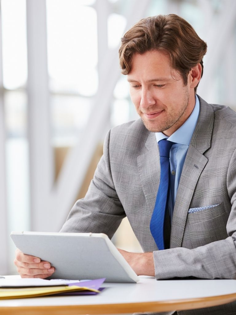 Business man on tablet